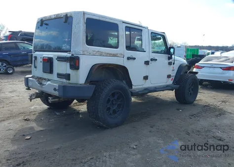 2011 Jeep Wrangler Unlimited Sahara из США, поврежденный, VIN 1J4HA5H10BL602015